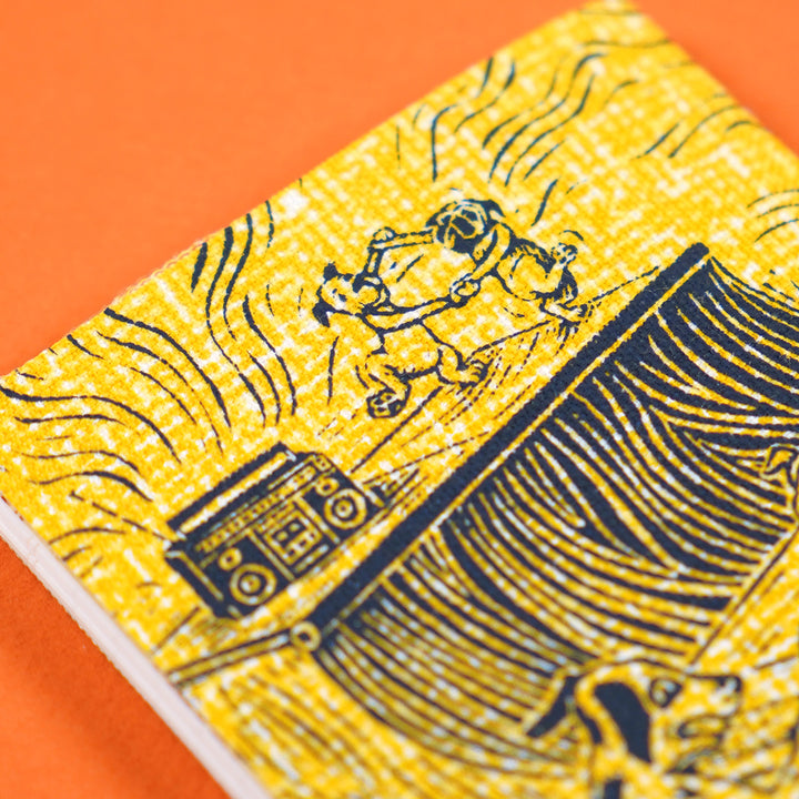 closeup of print design featuring two dogs dancing next to a portable stereo