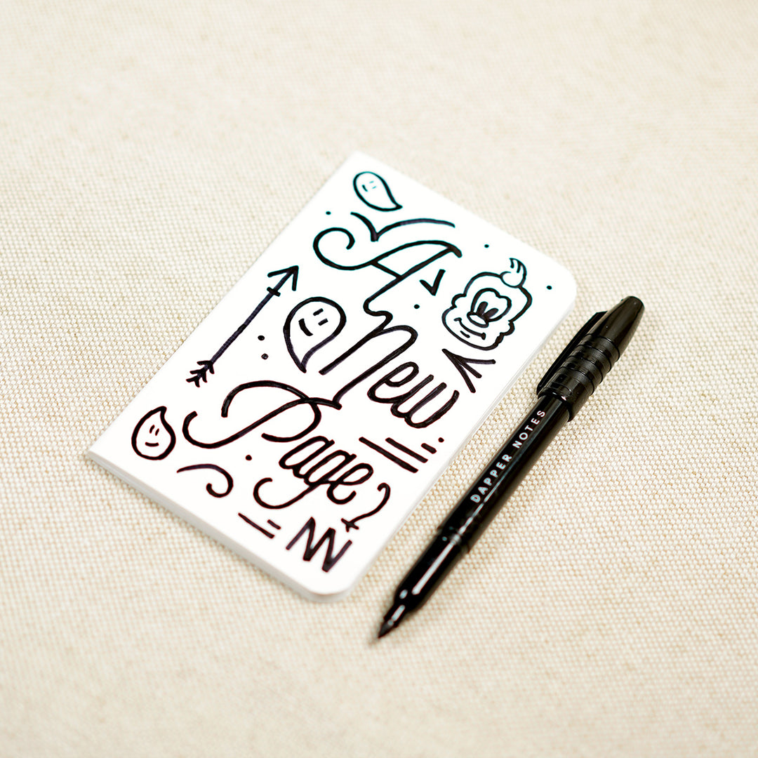 drawing on a dapper notes notebook