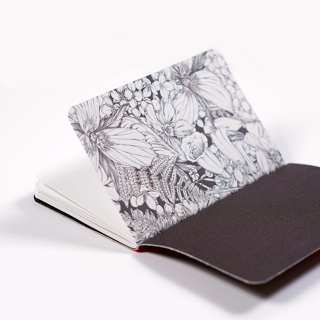 inside of Maggie Enterrios' Dapper Notes notebook, with a coloring book pattern