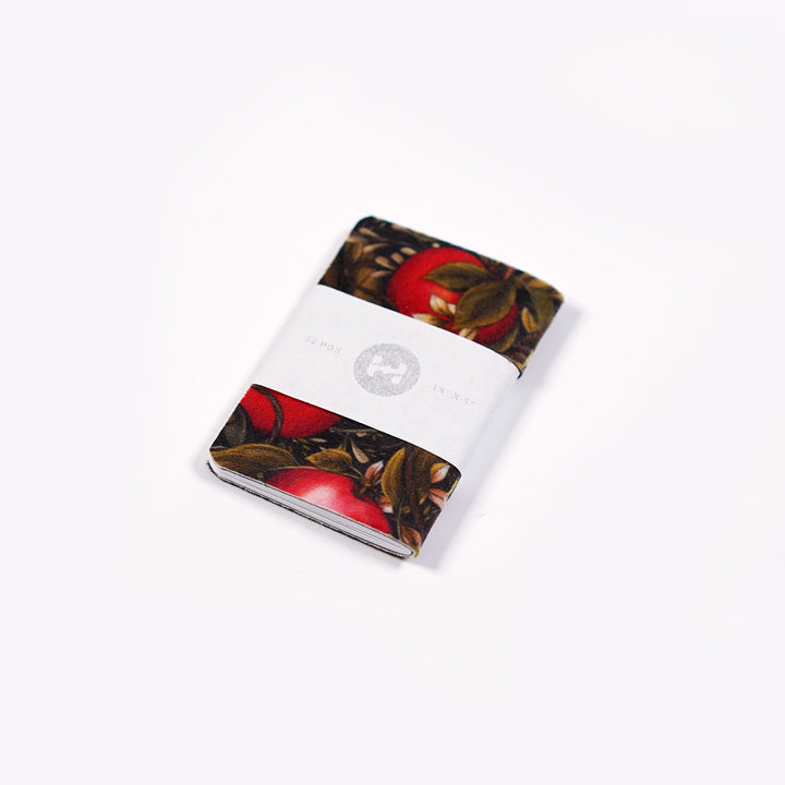 angled view of Maggie Enterrios's Dapper Notes miniature notebook