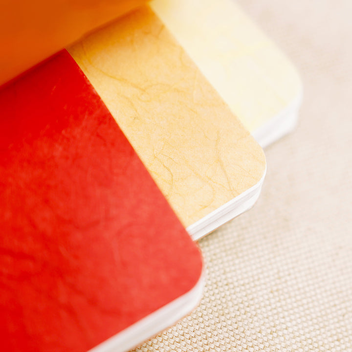 unruyu color papers in action: red, orange, yellow