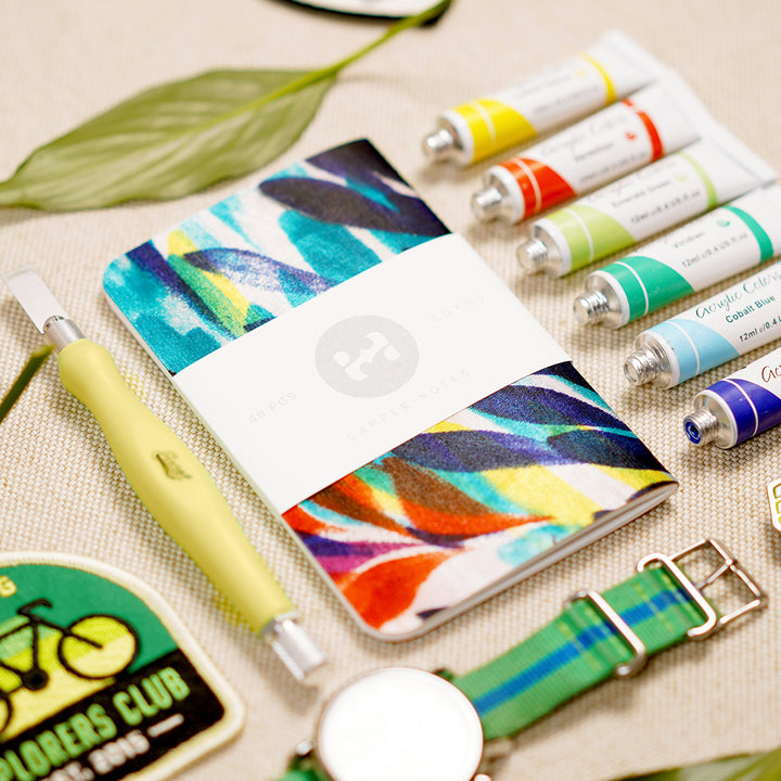 dkng studios explorers club, excel blades knife, timex watch, and dapper notes knolling