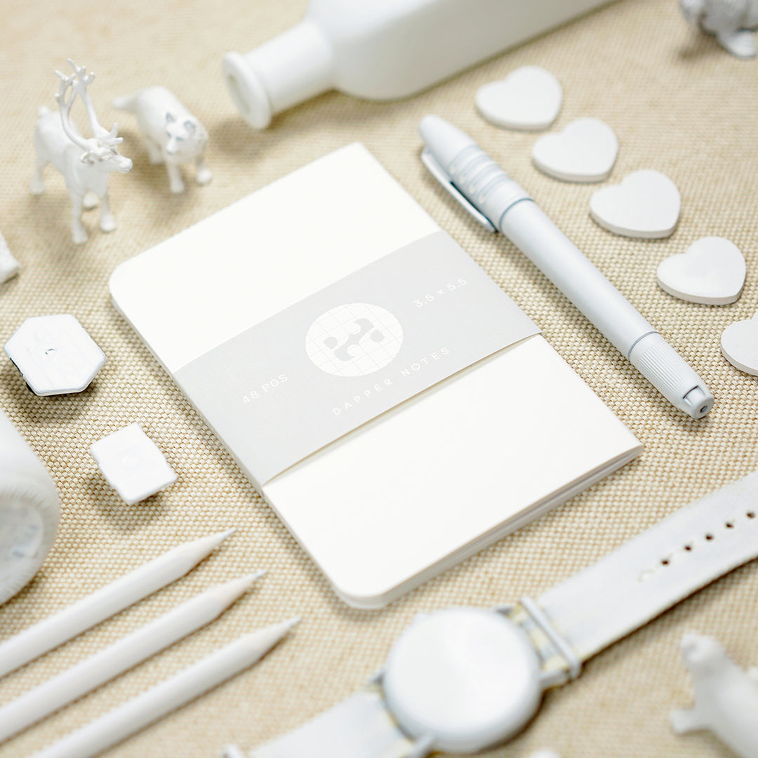 knolling white objects neatly arranged