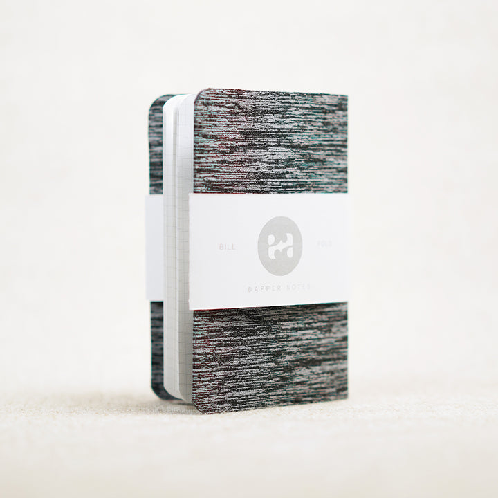 gray and white pocket notebook cover