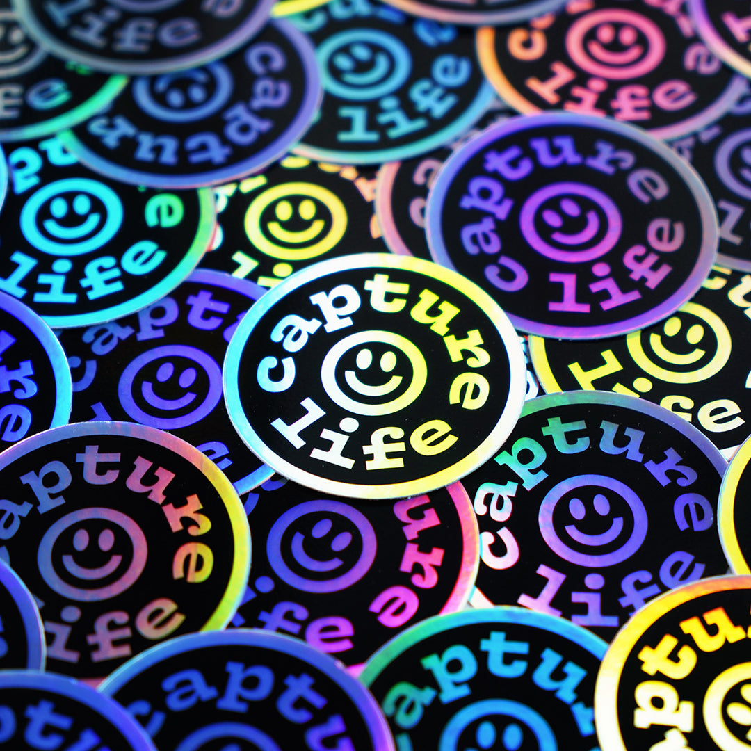 Capture Life smiley face holographic circle sticker